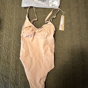 Never worn Skims Everyday Sculpt thong body suit
